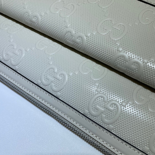 G*u*i gg embossed messenger bag