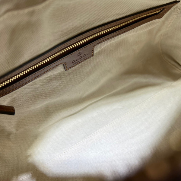 G*u*i gg matelassé leather top handle bag